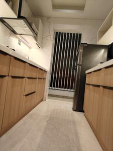 Kitchen Image of 938 Sq.ft 2 BHK Apartment / Flat for sale in Runwal The Central Park, Chinchwad Pune for Rs. 12500000