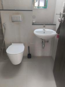 Common Bathroom Image of 585 Sq.ft 1 BHK Apartment / Flat for sale in Mahindra Roots, Kandivali East Mumbai for Rs. 13000000