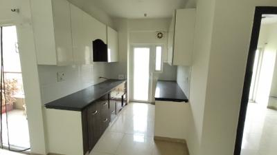 Kitchen Image of 1220 Sq.ft 3 BHK Apartment / Flat for sale in Gulshan Vivante, Sector 137 Noida for Rs. 16500000