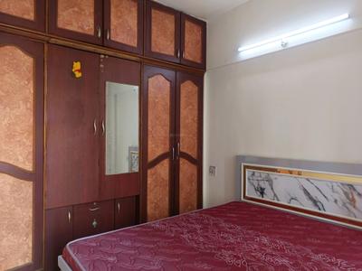 Bedroom Image of 580 Sq.ft 1 BHK Apartment / Flat for rent in Magarpatta Heliconia, Hadapsar Pune for Rs. 25000