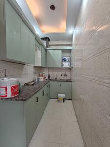 Kitchen Image of 450 Sq.ft 2 BHK Builder Floor for rent in Shiva Builders Floor lll, Dwarka Mor New Delhi for Rs. 18000