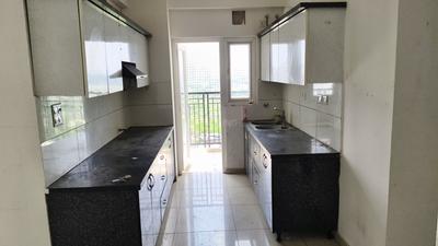 Kitchen Image of 1020 Sq.ft 2 BHK Apartment / Flat for rent in Gulshan Botnia, Sector 144 Noida for Rs. 33000