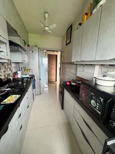 Kitchen Image of 720 Sq.ft 2 BHK Apartment / Flat for sale in Westin Karmayog, Andheri West Mumbai for Rs. 23000000
