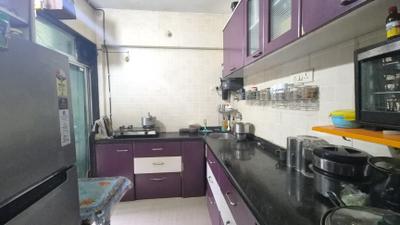 Kitchen Image of 953 Sq.ft 2 BHK Apartment / Flat for sale in Ronak Residency, Kalamboli Navi Mumbai for Rs. 8800000