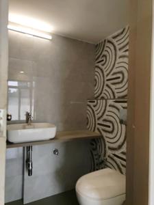 Common Bathroom Image of 1252 Sq.ft 2 BHK Apartment / Flat for sale in Shri Ratnaraj Skyline Wing B, Bhayandar West Mira Bhayandar for Rs. 13000000