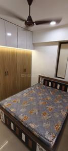 Bedroom Image of 780 Sq.ft 1 BHK Apartment / Flat for rent in Applewoods Satyesh Residency, Shela Ahmedabad for Rs. 18000