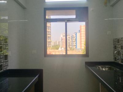 Kitchen Image of 650 Sq.ft 1 BHK Apartment / Flat for sale in Tharwani Vedant Nakshatra, Badlapur West Badlapur for Rs. 3100000