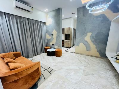 Living Room Image of 1090 Sq.ft 2 BHK Apartment / Flat for sale in Origin Wisteria Square, Mira Road East Mira Bhayandar for Rs. 9300000