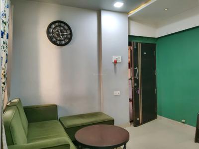 Living Room Image of 600 Sq.ft 1 BHK Apartment / Flat for sale in Puraniks Kanchan Pushp Society, Kasarvadavali Thane for Rs. 5700000