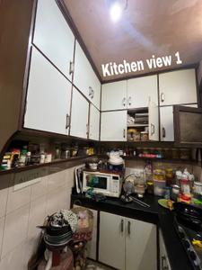 Kitchen Image of 1100 Sq.ft 3 BHK Apartment / Flat for sale in Jamia Nagar New Delhi for Rs. 7000000