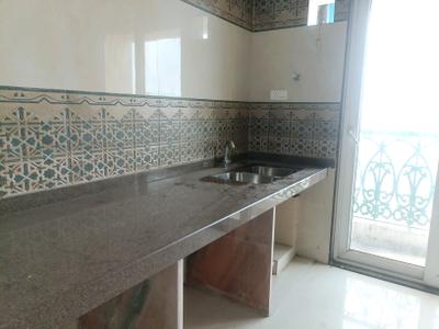 Kitchen Image of 1000 Sq.ft 1 BHK Apartment / Flat for sale in Metro Satyam Queens Necklace, Taloja Navi Mumbai for Rs. 6000000
