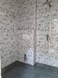 Common Bathroom One Image of 900 Sq.ft 3 BHK Apartment / Flat for sale in Dwarka Mor New Delhi for Rs. 5800000