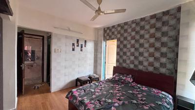 Bedroom Image of 700 Sq.ft 1.5 BHK Apartment / Flat for rent in Kaamdhenu Swarna Anant, Kopar Khairane Navi Mumbai for Rs. 38000