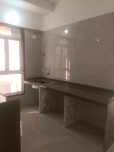 Kitchen Image of 653 Sq.ft 2 BHK Apartment / Flat for sale in Digam Poonam CHSL, Borivali East Mumbai for Rs. 18000000
