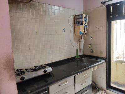 Kitchen Image of 680 Sq.ft 1 BHK Apartment / Flat for rent in Platinum Silver Classic, Kalamboli Navi Mumbai for Rs. 20000