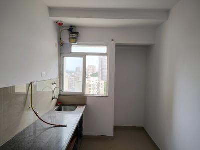Kitchen Image of 920 Sq.ft 2 BHK Apartment / Flat for rent in Puraniks City Reserva Phase 1 by Puraniks Builders Pvt. Ltd, Thane West Thane for Rs. 26000