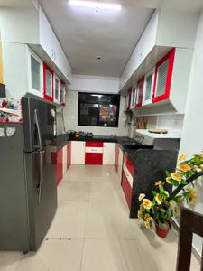Kitchen Image of 900 Sq.ft 2 BHK Apartment / Flat for rent in Mont Vert Seville, Wakad Pune for Rs. 36000