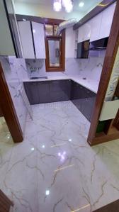 Kitchen Image of 810 Sq.ft 3 BHK Apartment / Flat for sale in Bindapur New Delhi for Rs. 7000000