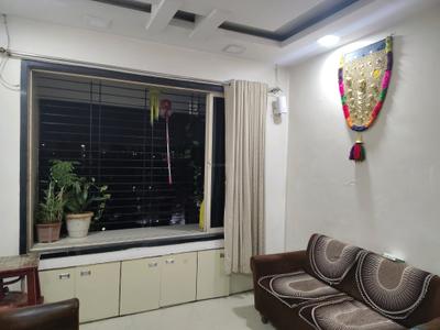 Living Room Image of 700 Sq.ft 1 BHK Apartment / Flat for rent in Paradigm Pushpanjali Residency Phase III, Kasarvadavali Thane for Rs. 16548
