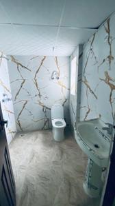 Bathroom Image of 860 Sq.ft 2 BHK Apartment / Flat for rent in Migsun Vilaasa, Eta II Greater Noida for Rs. 21000