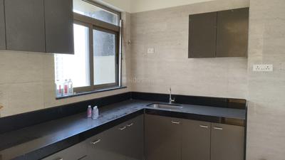 Kitchen Image of 950 Sq.ft 2 BHK Apartment / Flat for sale in Sheth Auris Serenity, Malad West Mumbai for Rs. 29900000
