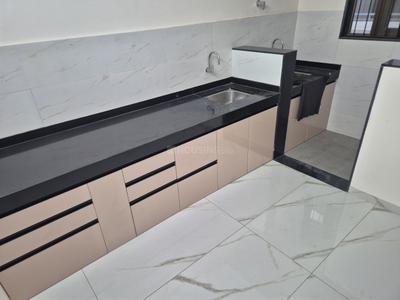 Kitchen Image of 950 Sq.ft 2 BHK Apartment / Flat for sale in Tathawade Pune for Rs. 7499999