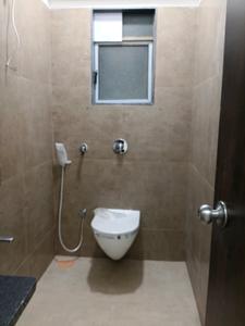 Common Bathroom Image of 1075 Sq.ft 2 BHK Apartment / Flat for sale in MICL Aaradhya Parkwood, Mira Road East Mira Bhayandar for Rs. 13400000