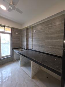 Kitchen Image of 906 Sq.ft 3 BHK Apartment / Flat for sale in New India Om Mayuresh, Mulund East Mumbai for Rs. 22500000