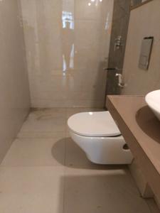 Common Bathroom Image of 1000 Sq.ft 2 BHK Apartment / Flat for sale in APK Sky Garden, Mohammed Wadi Pune for Rs. 7300000