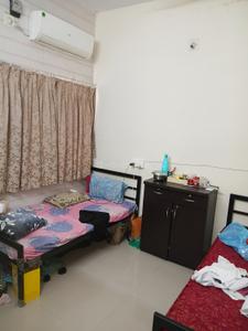 Bedroom Image of NAVYA PG SERVICE in Satellite, Ahmedabad