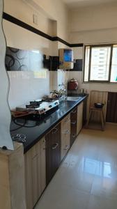 Kitchen Image of 1050 Sq.ft 2 BHK Apartment / Flat for sale in Akshar Habitat, Koteshwar Ahmedabad for Rs. 5100000