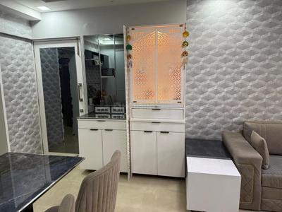 Living Room Image of 650 Sq.ft 2 BHK Apartment / Flat for sale in Paradigm Ananda Residency, Borivali West Mumbai for Rs. 23000000