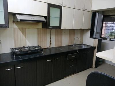 Kitchen Image of 954 Sq.ft 2 BHK Apartment / Flat for rent in Ajmera Bhakti Park, Wadala East Mumbai for Rs. 75000