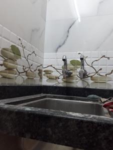 Kitchen Image of 450 Sq.ft 2 BHK Builder Floor for sale in Malad West Mumbai for Rs. 8800000