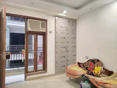 Bedroom Image of 1000 Sq.ft 2 BHK Builder Floor for rent in Murari Sharma, Rajpur Khurd Village New Delhi for Rs. 23000