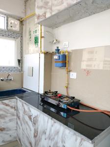 Kitchen Image of 550 Sq.ft 1 BHK Apartment / Flat for rent in Vikram Golf View Condos, Sector 19 Dwarka New Delhi for Rs. 24000
