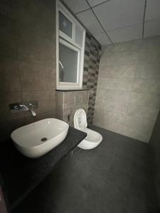 Bathroom Image of 605 Sq.ft 1 BHK Apartment / Flat for rent in Mahindra Eden, Jyotipuram Bengaluru for Rs. 30000