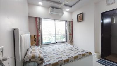 Bedroom Image of 750 Sq.ft 2 BHK Apartment / Flat for sale in Neelyog Aashiyana, Kandivali West Mumbai for Rs. 15800000