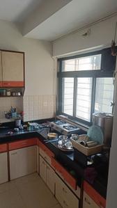 Kitchen Image of 1000 Sq.ft 2 BHK Apartment / Flat for rent in Kanakia Eternity Friends CHS, Dharamveer Nagar Thane for Rs. 60000