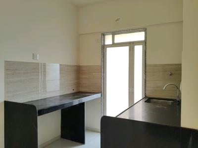 Kitchen Image of 630 Sq.ft 2 BHK Apartment / Flat for rent in Godrej Upavan, Bhiwandi Thane for Rs. 18500