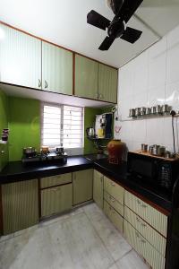 Kitchen Image of 990 Sq.ft 2 BHK Apartment / Flat for sale in Satellite Ahmedabad for Rs. 8500000