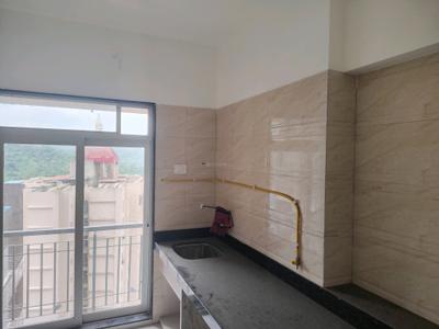 Kitchen Image of 575 Sq.ft 1 BHK Apartment / Flat for rent in Unnati Woods Phase 7, Kasarvadavali Thane for Rs. 17000