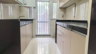 Kitchen Image of 654 Sq.ft 2 BHK Apartment / Flat for sale in Rustomjee Erika, Bandra East Mumbai for Rs. 24000000