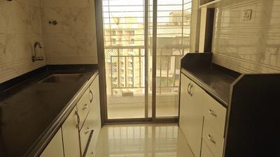 Kitchen Image of 670 Sq.ft 1 BHK Apartment / Flat for sale in Om Prabhu Manohar CHS, Seawoods Navi Mumbai for Rs. 12000000