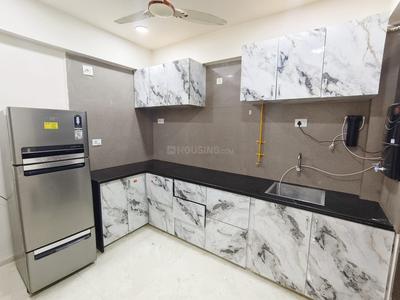 Kitchen Image of 1180 Sq.ft 2 BHK Apartment / Flat for rent in Omkar Swarnim Paradise Phase 1, Sector 14 Gandhinagar for Rs. 16500