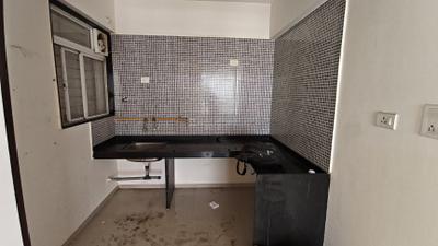 Kitchen Image of 670 Sq.ft 1 BHK Apartment / Flat for sale in Gagan Micasaa, Wagholi Pune for Rs. 3800000