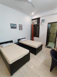 Bedroom Image of Urbanroomz Coliving PG in Sector 57, Gurgaon