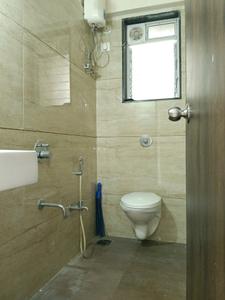 Common Bathroom Image of 600 Sq.ft 1 BHK Apartment / Flat for sale in Mulund East Mumbai for Rs. 11000000