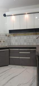 Kitchen Image of 1250 Sq.ft 3 BHK Apartment / Flat for sale in Shalimar Garden Ghaziabad for Rs. 5800000