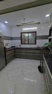 Kitchen Image of 1800 Sq.ft 3 BHK Apartment / Flat for sale in Pal Surat for Rs. 8500000